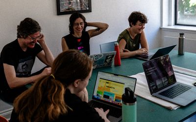 Members of the Common Knowledge team working at Pelican House